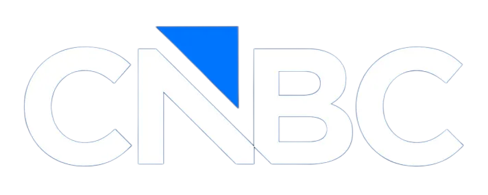 The CNBC logo in white outline text on a white background, featuring a blue triangular accent above the letter N.