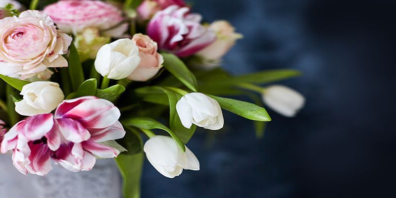 Memorial Flower Subscription with flower bouquet and blue background
