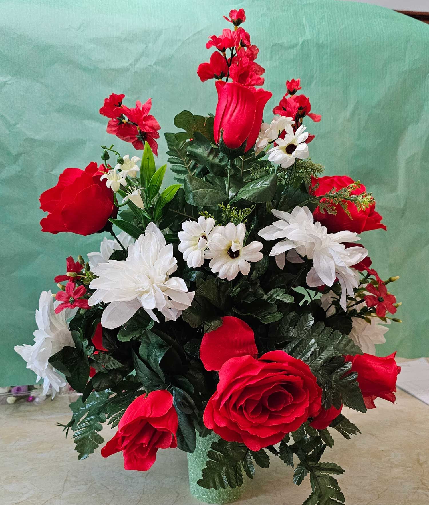 Mixed flowers for Holiday Flower Package offered by Hiwassee Memorial Gardens in Charleston, TN