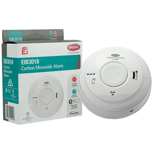 A Carbon Monoxide Alarm, White, Next to Its Box — FNQ Smoke Alarms & Maintenance in Goldsborough, QLD