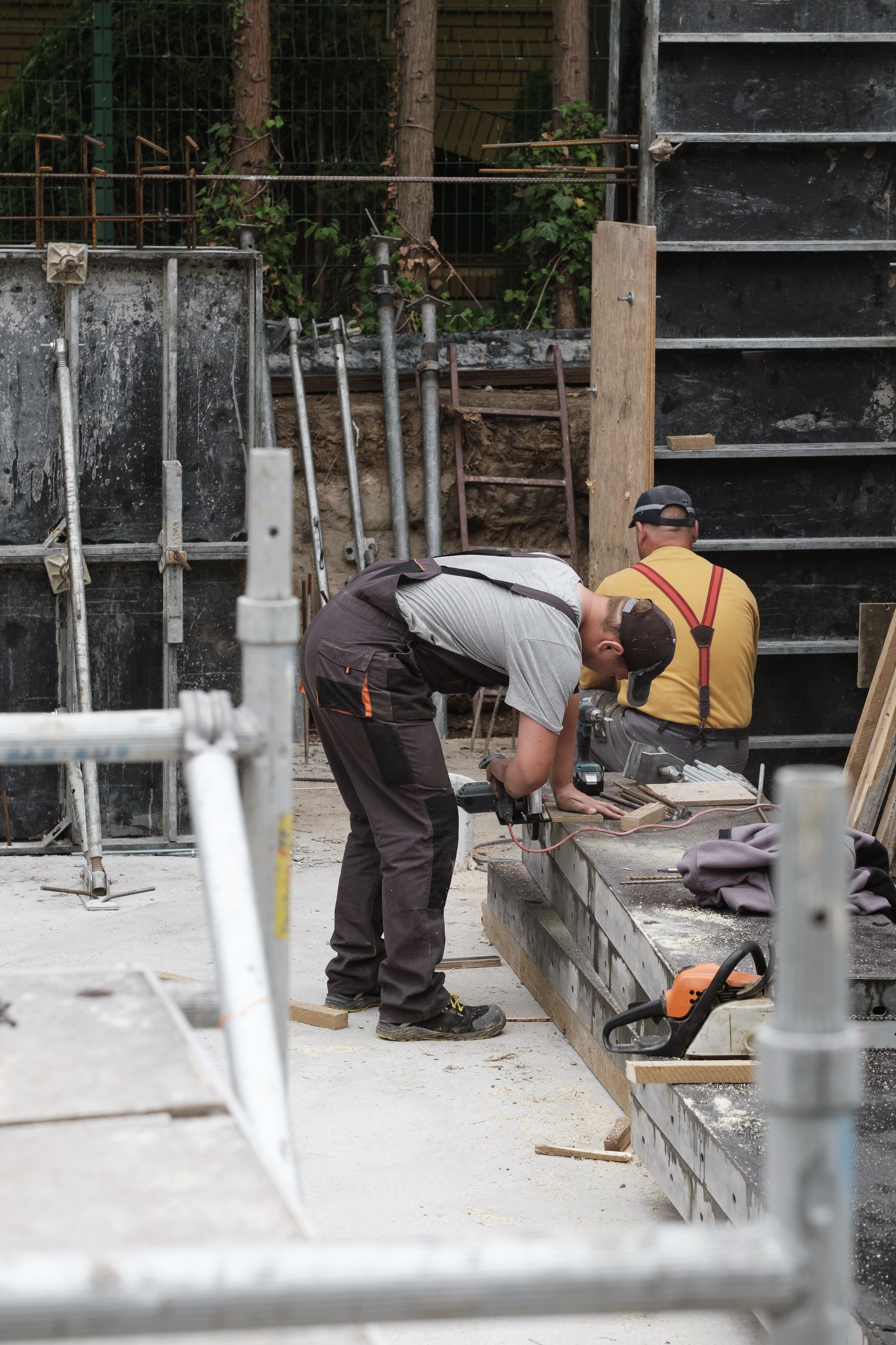 man working at a construction site building house