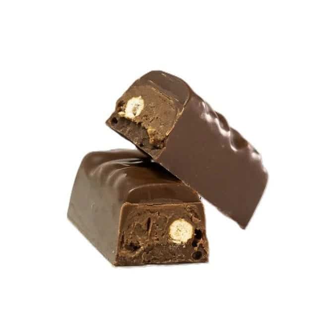 Two chocolate-covered candy bars with a creamy nut filling, stacked on a white background