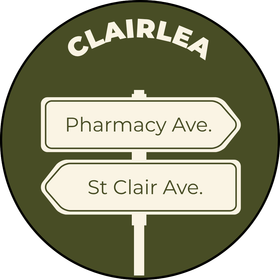 Clairlea neighborhood sign with arrows for Pharmacy Ave. and St Clair Ave. on an olive-green background