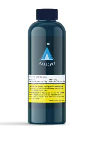 Dark blue bottle with a black cap and blue-and-yellow label