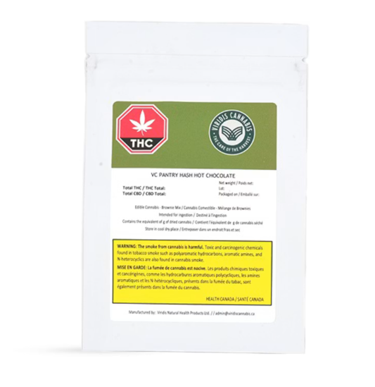 White cannabis product pouch with green labels, THC and warning symbol, centered on plain background