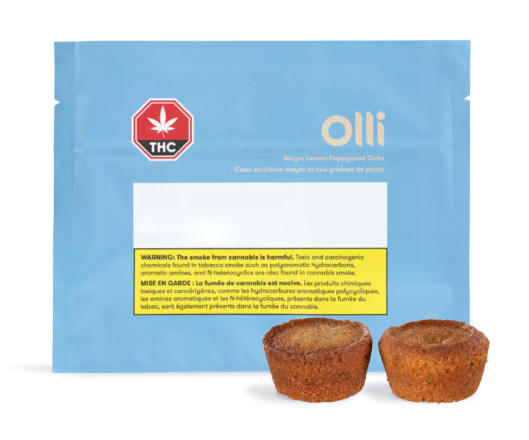 Blue THC edible package with two small brown muffins in front