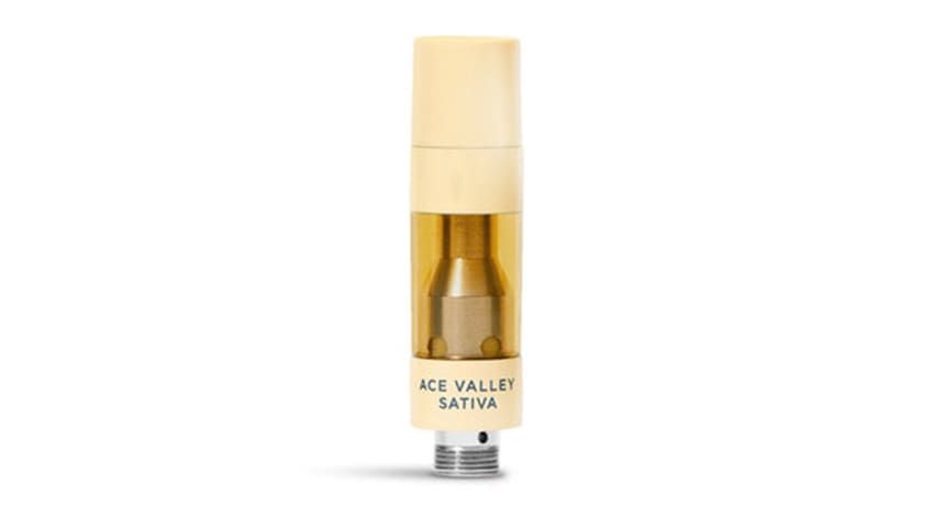 Small beige bottle of ACE Viality Baby oil with clear liquid inside on a white background