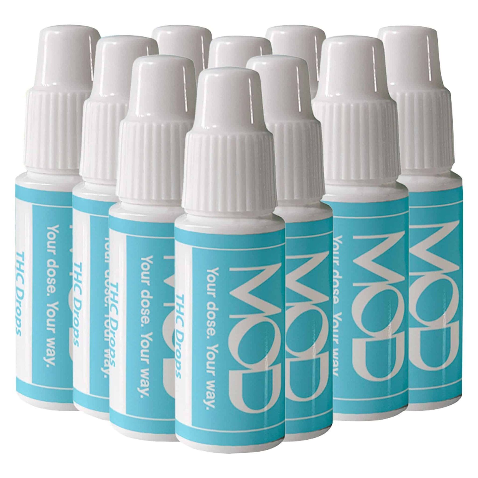 Six turquoise MOD bottles with white caps grouped together on a white background.