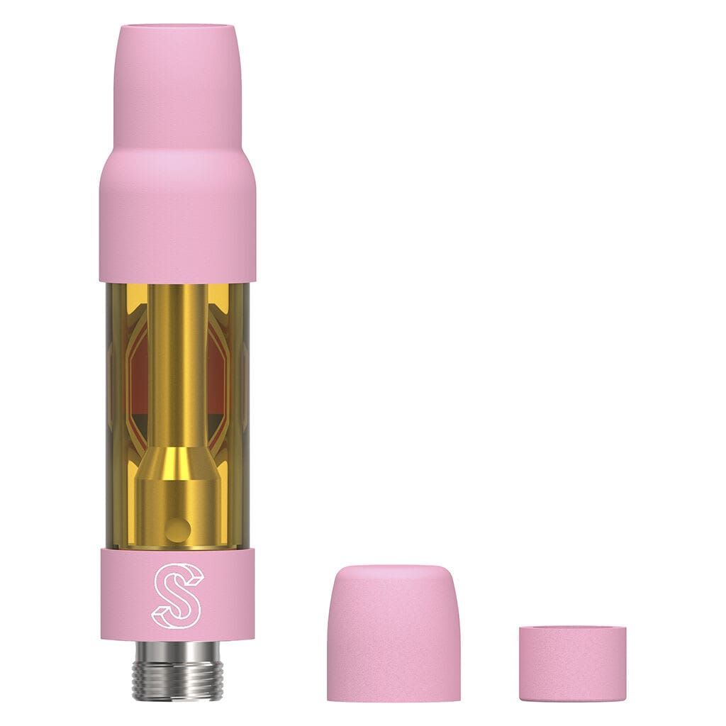 Pink cannabis vape cartridge with cap off, showing a gold internal chamber and two pink cap pieces beside it
