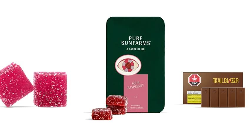 Assorted candies and chocolate bars on a white background, including pink gummies and a green Pure Sunfarms package