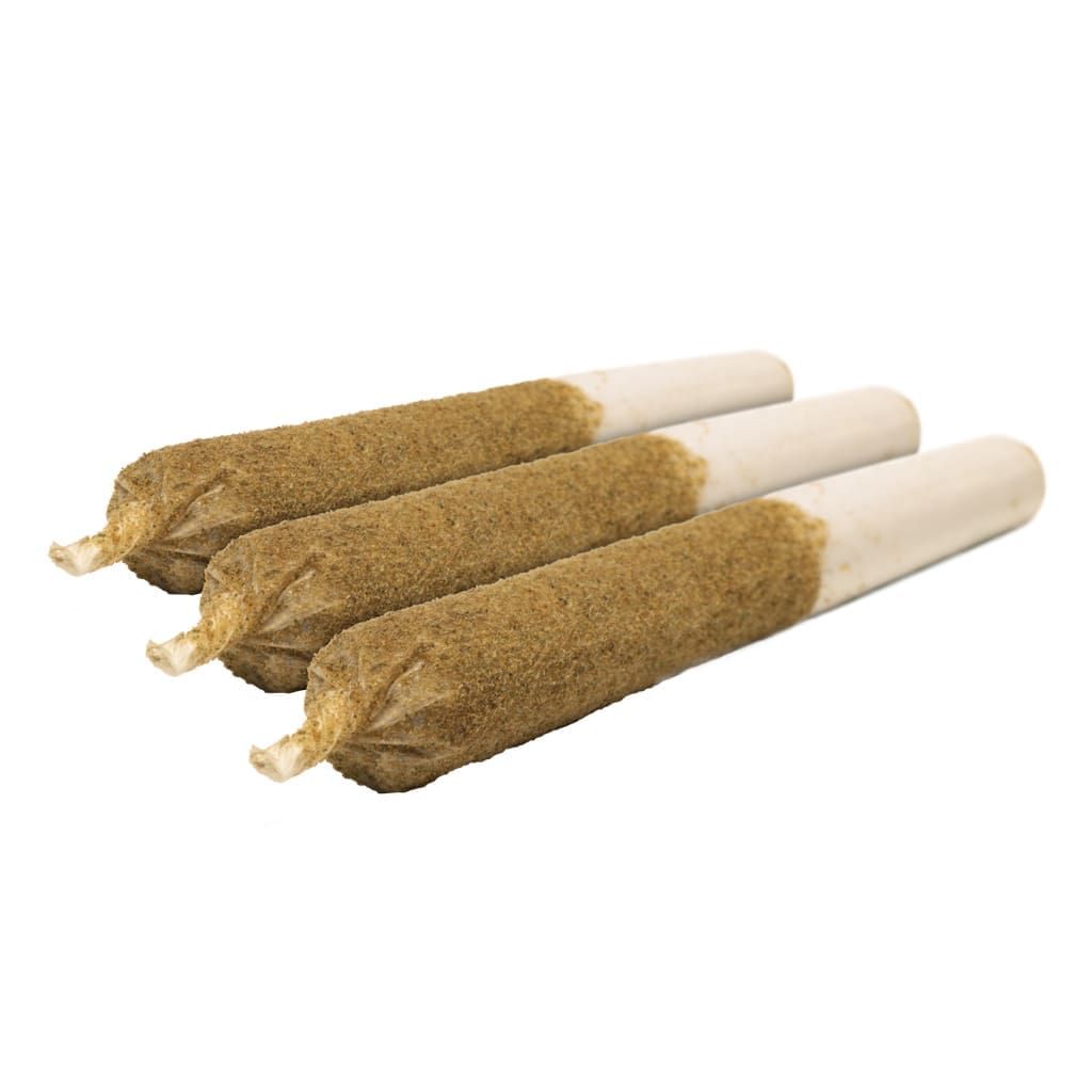 Three brown-topped cannabis pre-rolls with white filters on a white background
