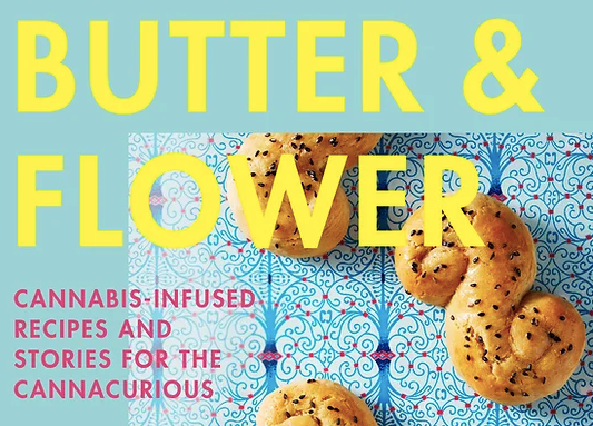 Book cover with yellow title text and pastries on a blue patterned background.
