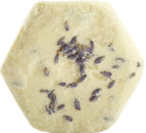 Hexagonal pale cookie or cracker with scattered purple dried lavender buds