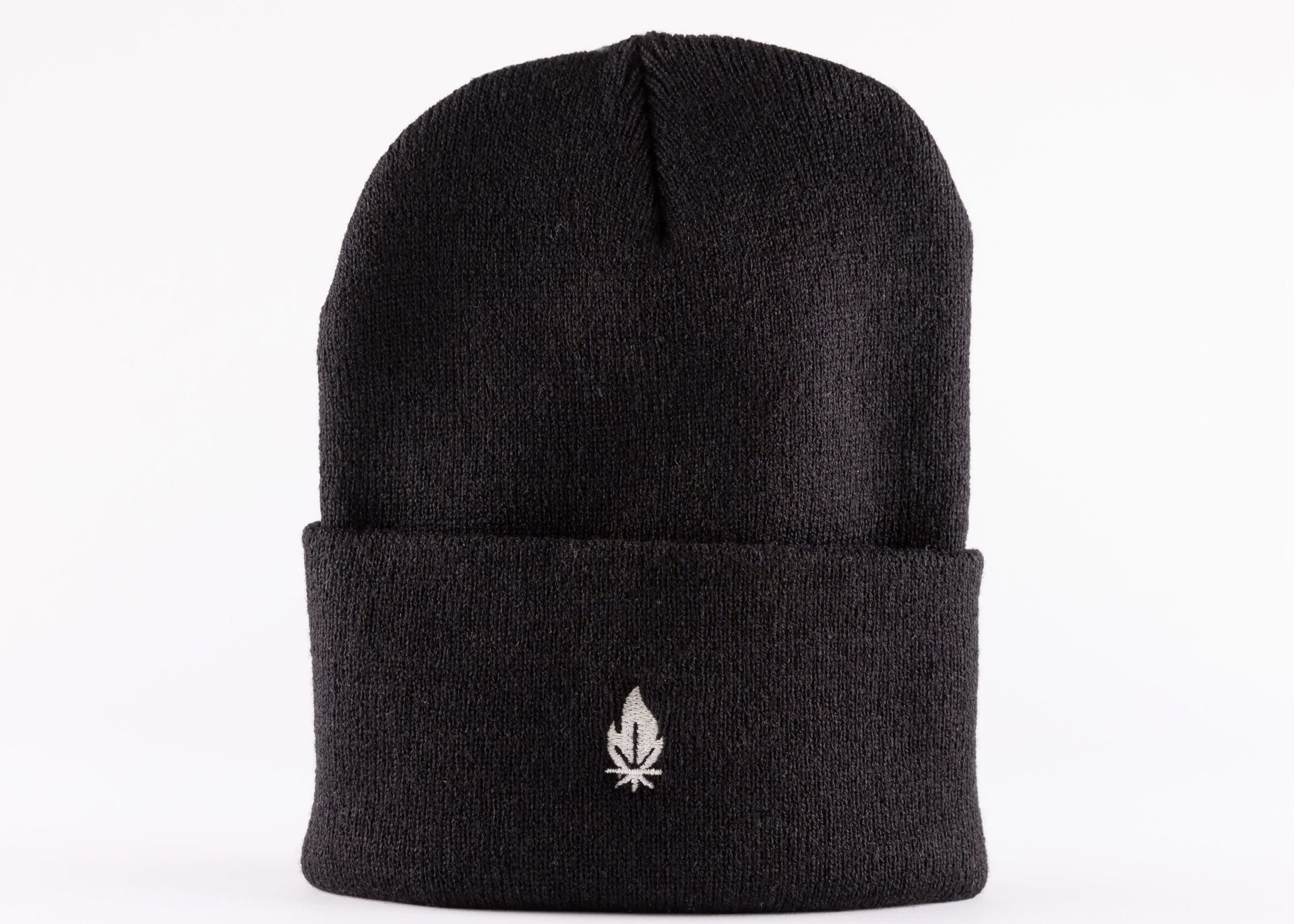 Black knit beanie with folded cuff and small white logo on the front