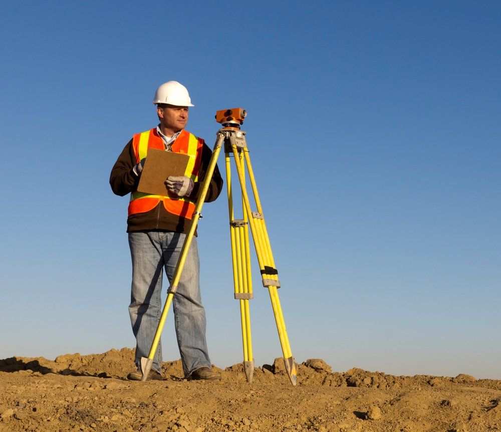 Surveyor on Empty Lot — Osborne Park, WA — Cottage & Engineering Surveys