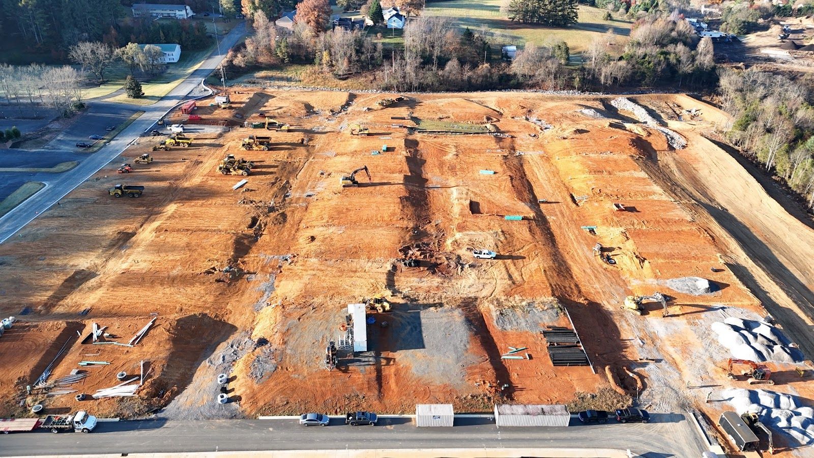 An aerial view of a construction site with a lot of dirt.