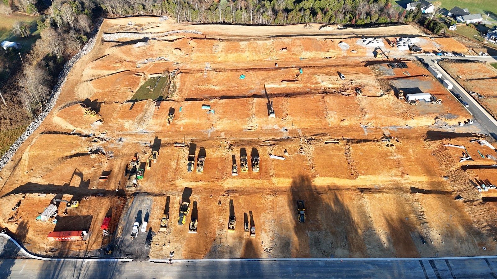 FREE Estimate An aerial view of a construction site with a lot of dirt.