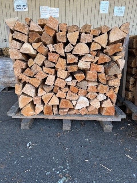 A bunch of wooden blocks are stacked on top of each other.