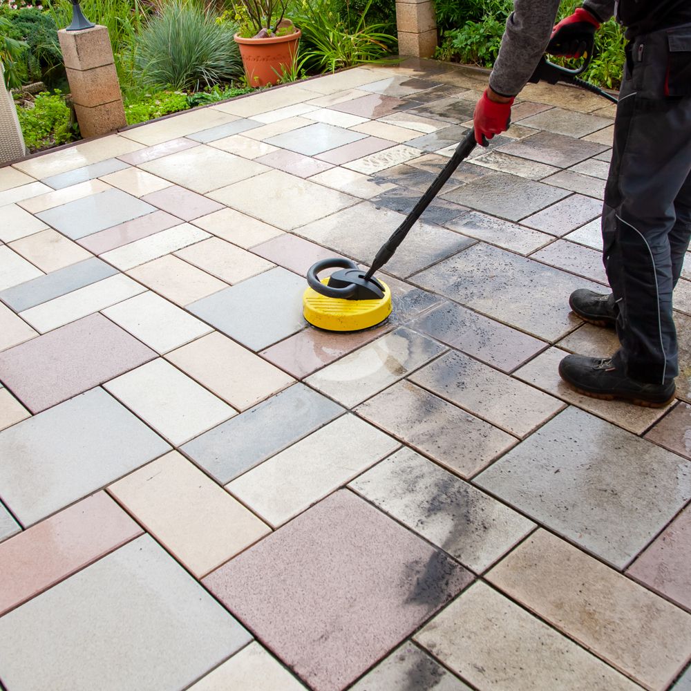 Professional Worker Cleaning Patio Professional Worker Cleaning Patio