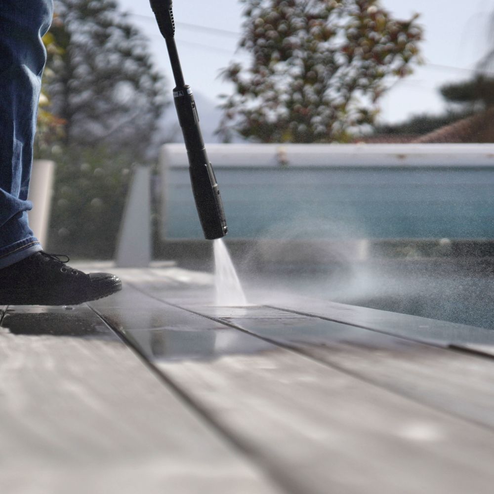 Professional Worker Cleaning Old Pool Deck Professional Worker Cleaning Old Pool Deck