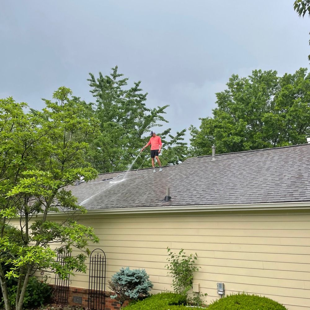Professional Worker Cleaning Dirty Driveway Professional Worker Cleaning Dirty Driveway