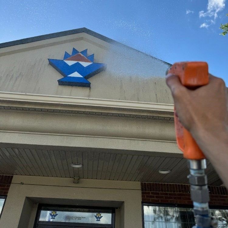 Professional Worker Doing Commercial Building Wall Cleaning Professional Worker Doing Commercial Building Wall Cleaning