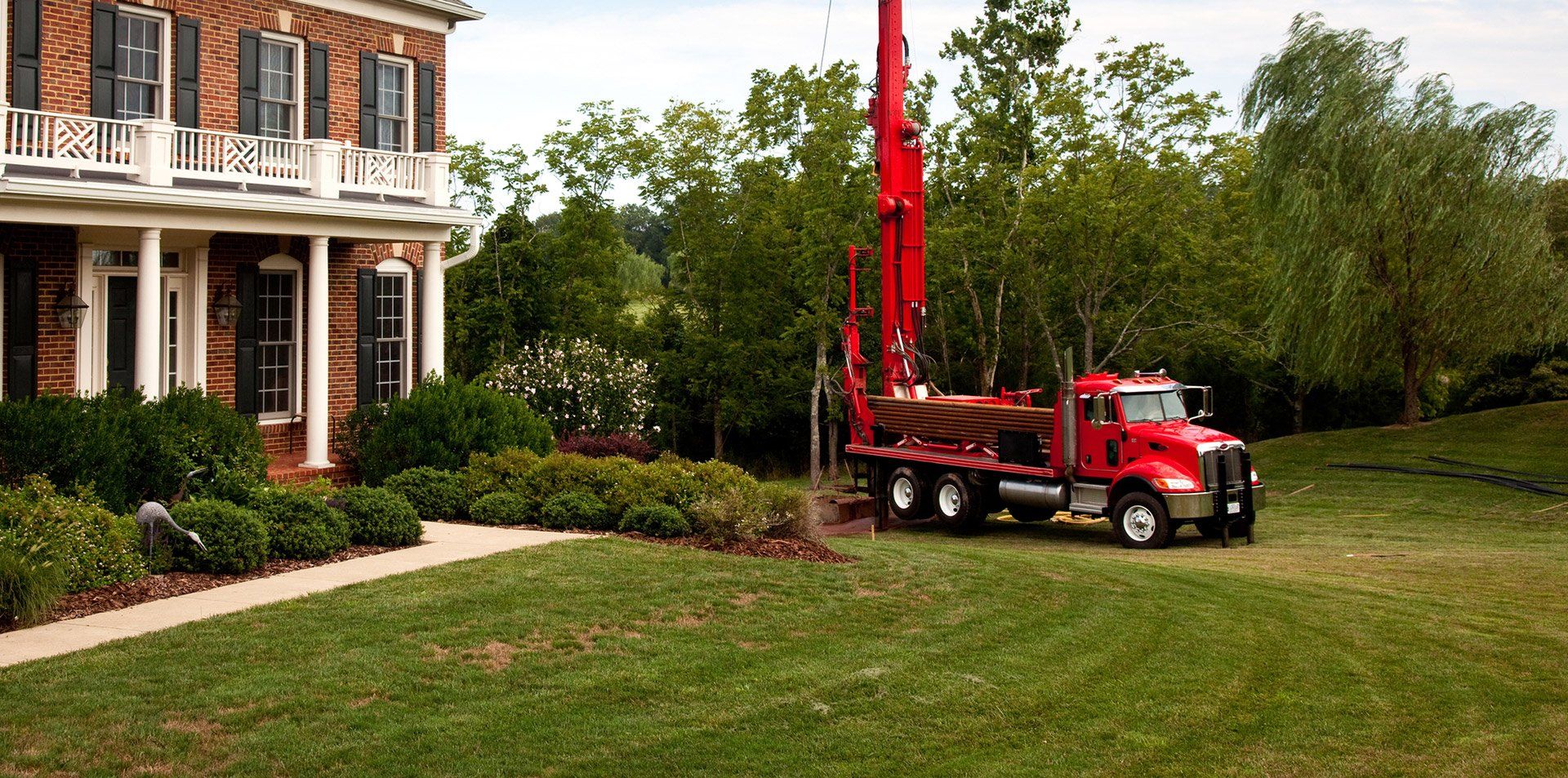James Cress Jr. Water Pump Co. & Well Drilling Vehicle on Asheboro, NC Property