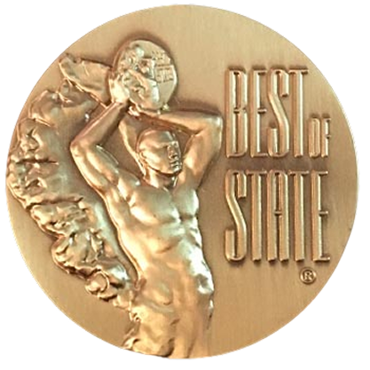 Gold medal with Atlas figure holding globe, text 