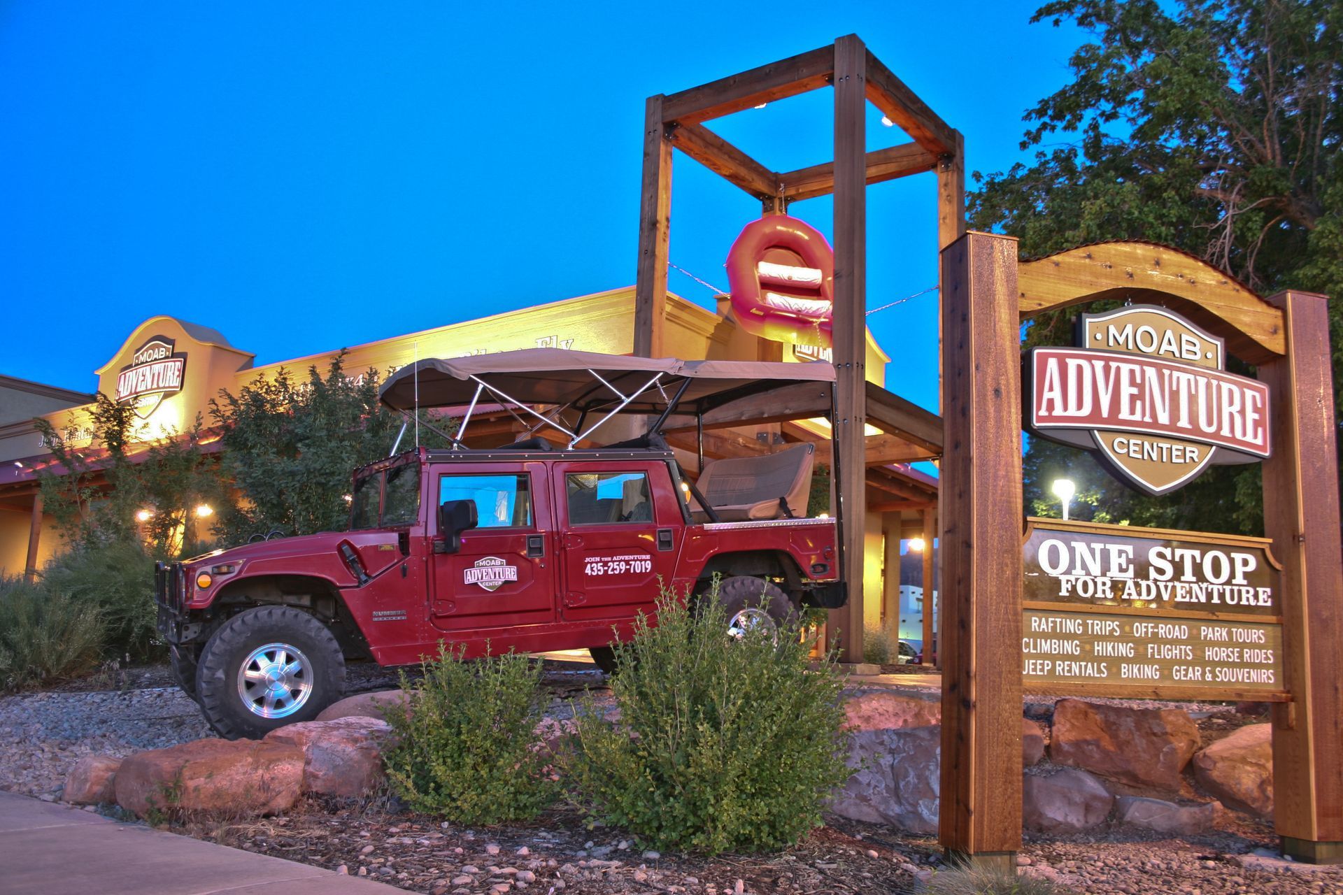 Red Hummer and sign for 