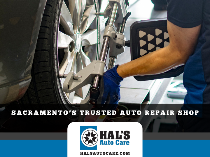 Mechanic using alignment tools on a car wheel at Hal's Auto Care in Sacramento. | Hal's Auto Care