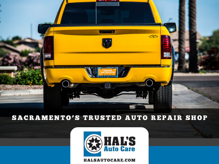 Yellow Dodge Ram pickup truck, rear view, with Hal's Auto Care logo. Sacramento, CA.
