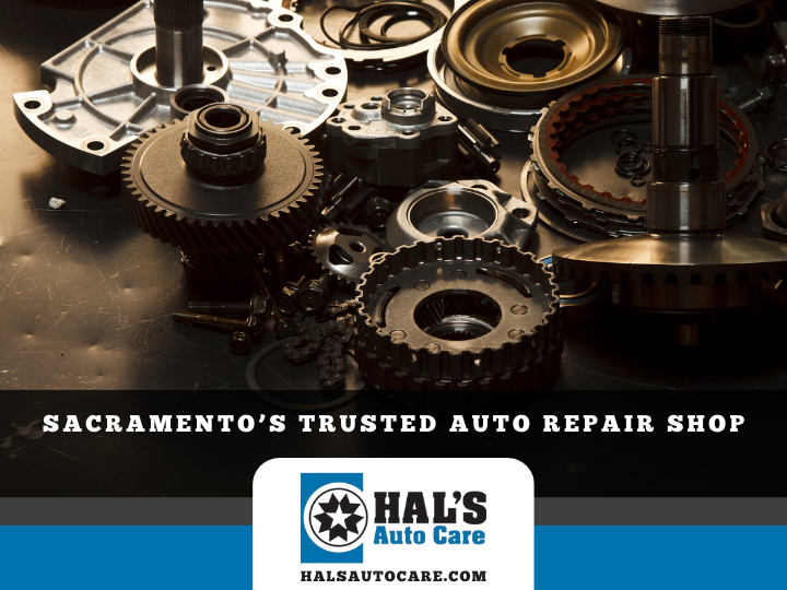 Auto parts on a shop table, with text for Hal's Auto Care in Sacramento.