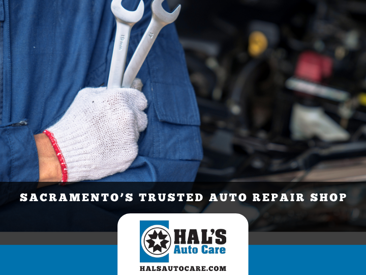 Mechanic holding wrenches, Hal's Auto Care logo below,