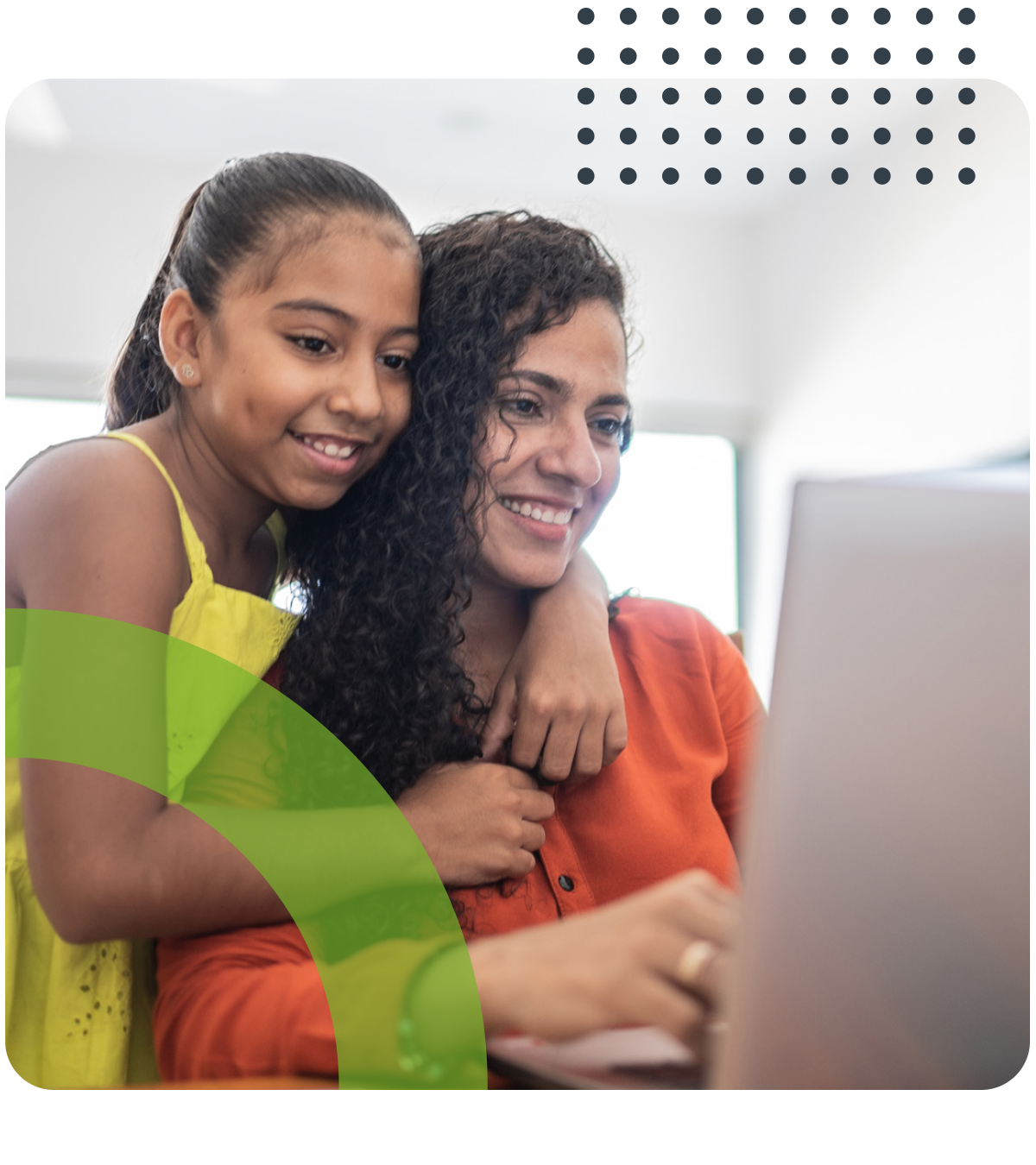 A woman and a girl are looking at a laptop computer.