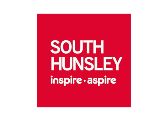 A red square with white text that says south hunsley inspire aspire