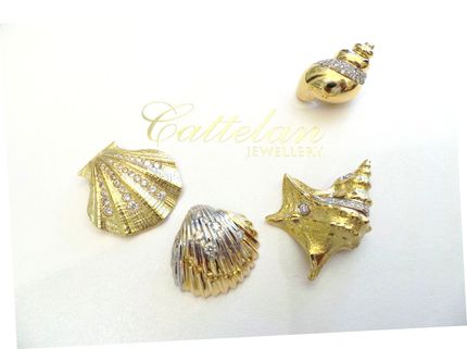 Cattelan - conchiglie oro 750 e diamanti