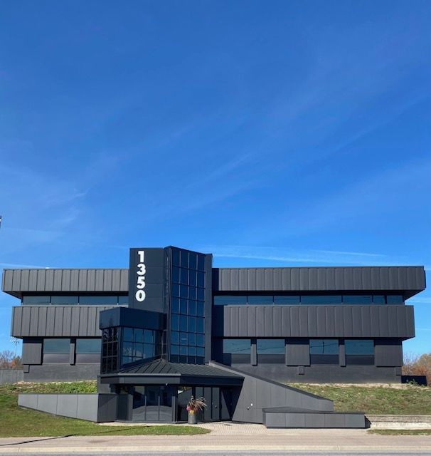 A large building with the number 1450 on the side of it