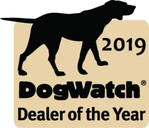 Black dog silhouette atop a tan rectangle with