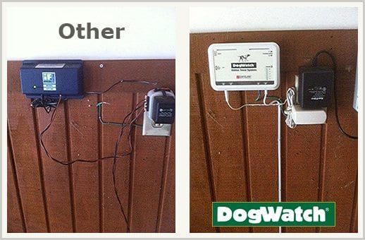 Side-by-side comparison of two dog fence systems mounted on a wood panel: