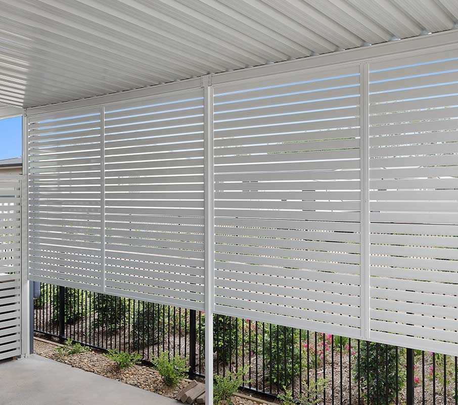 Interior View of a Room With Closed Vertical Blinds — Seaview Blinds & Shutters in Woodbury, QLD