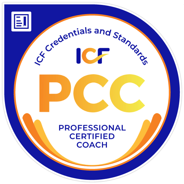 ICF Professional Certified Coach badge in blue, white, and orange with large “PCC” text and ICF logo
