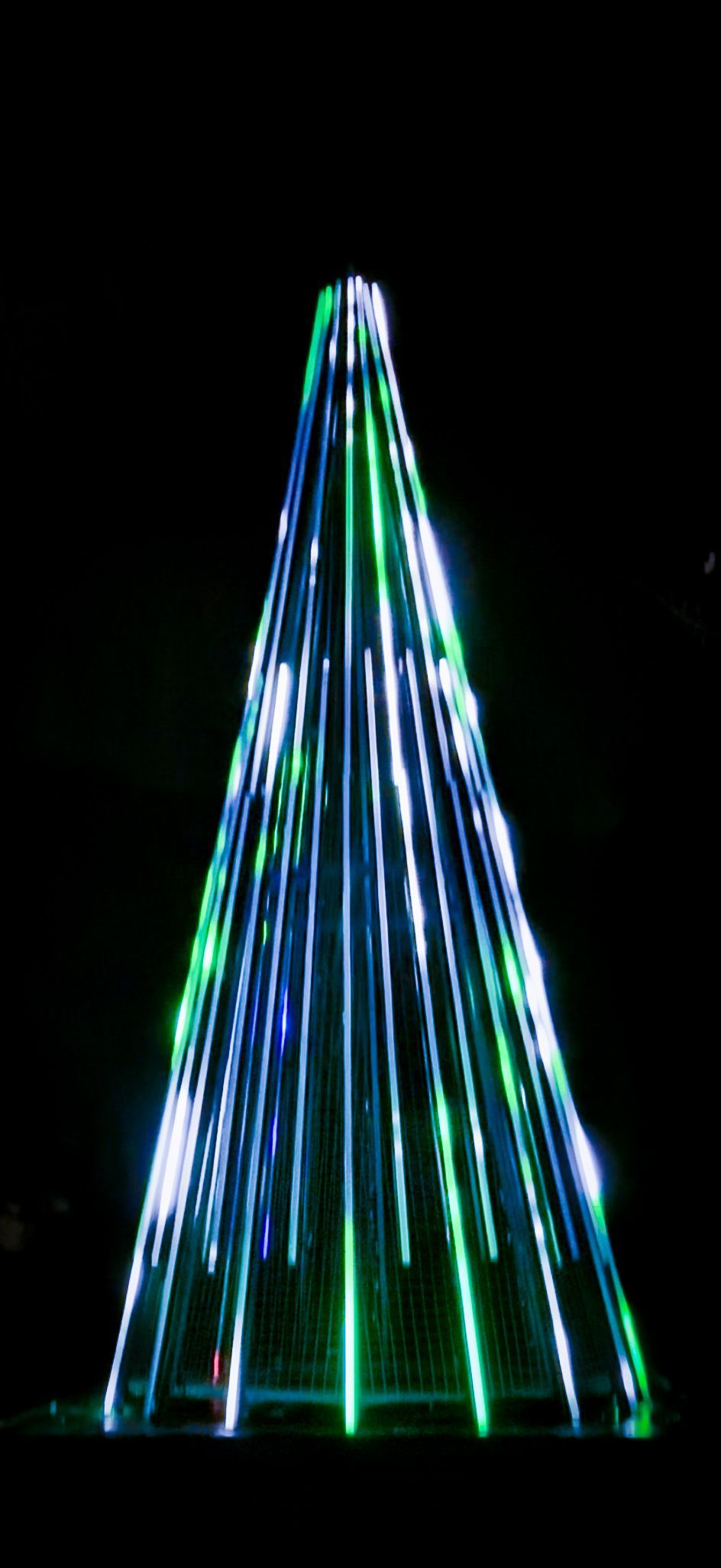 Pixel LED Christmas tree creating immersive 3D light patterns synced to music