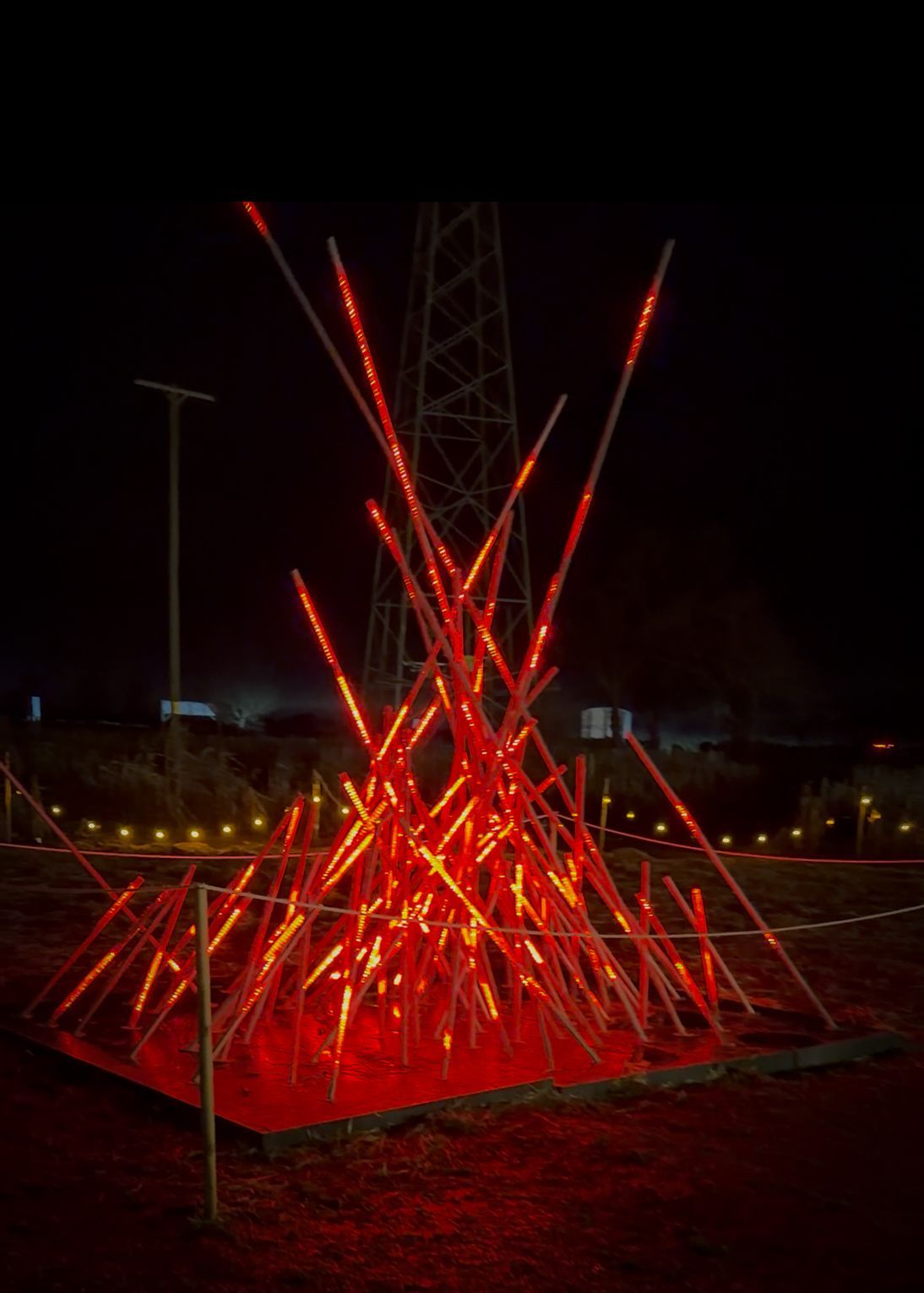 3D animated light tube fire installation adding visual warmth to event