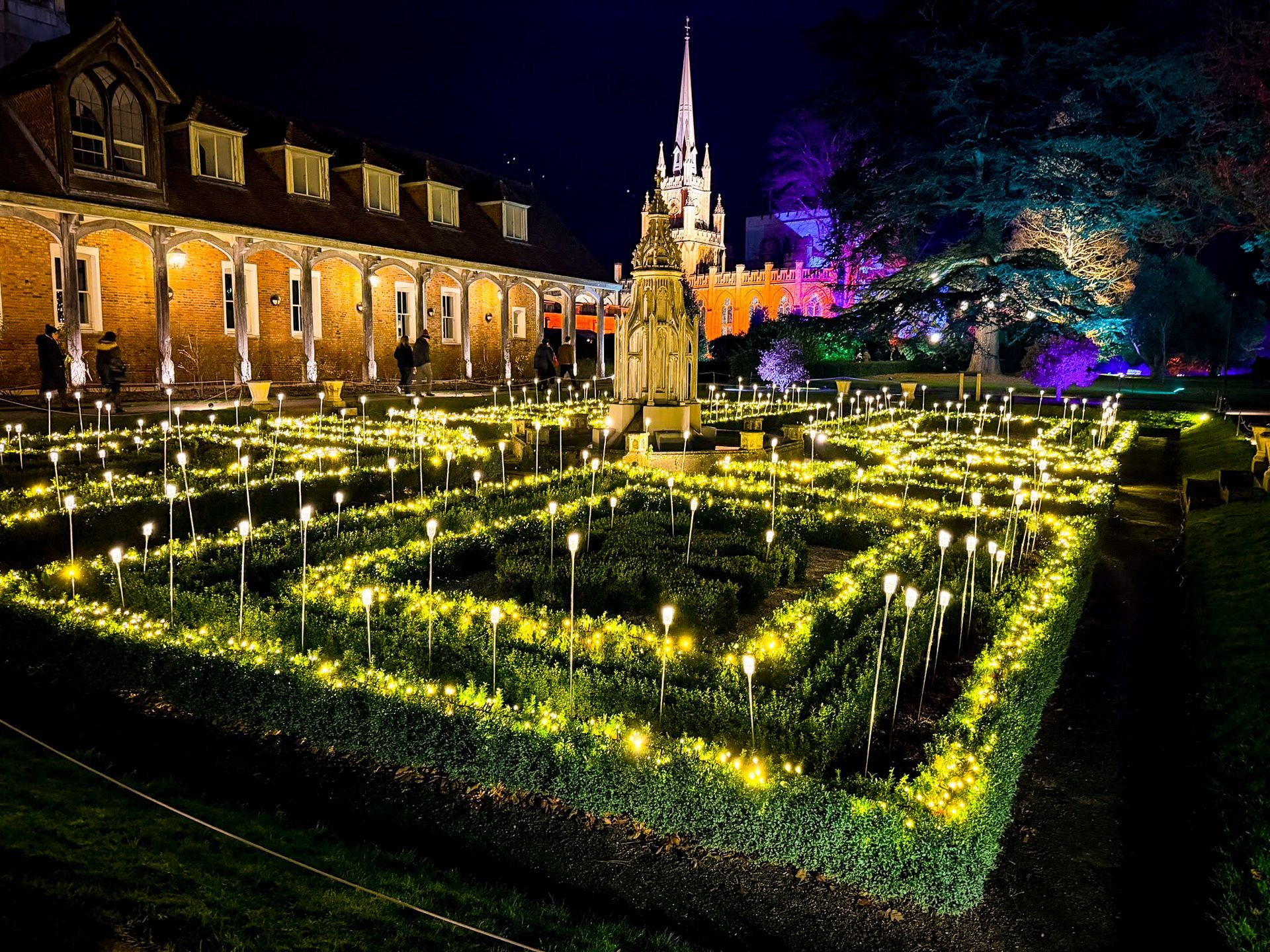 Illuminated rose gardens and raised flower beds with custom and standard lighting.