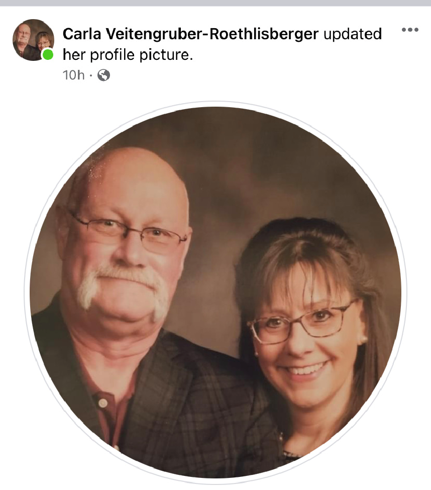 a man and a woman are posing for a picture in a circle .