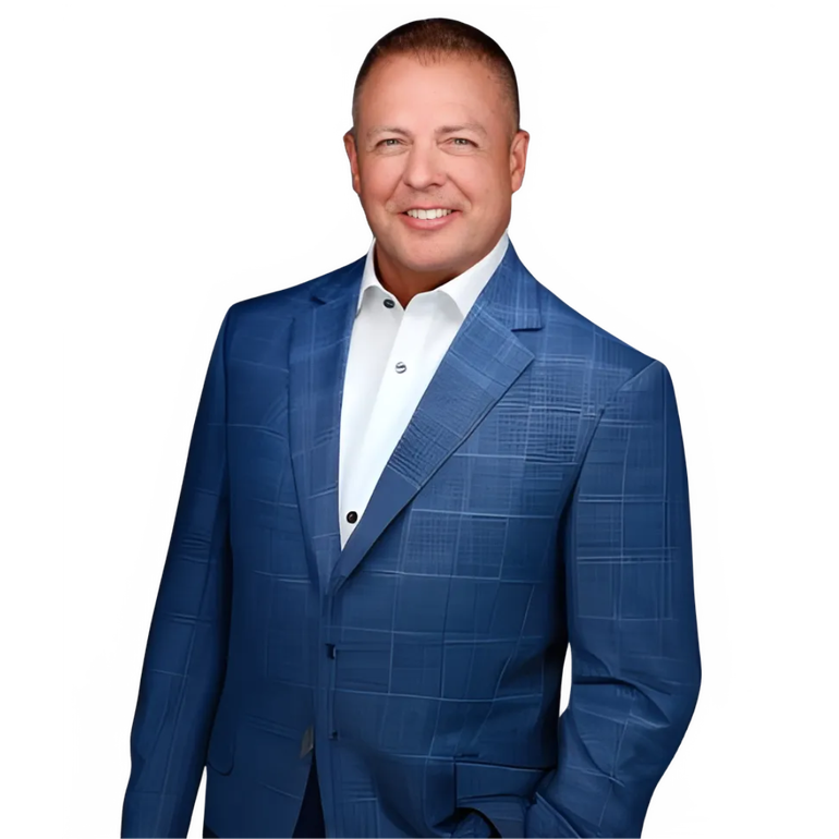 Smiling person in a blue suit jacket and white shirt on a plain white background