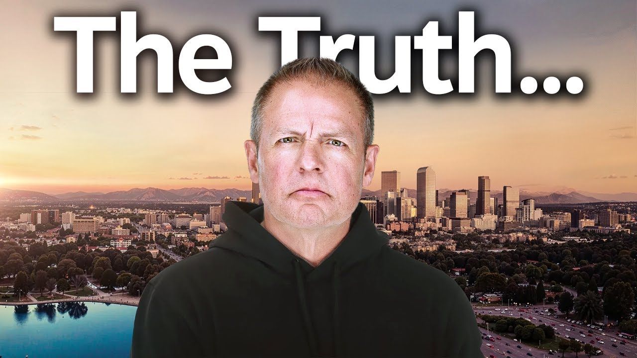 Man in a black hoodie before a city skyline at sunset, with the text “The Truth...”