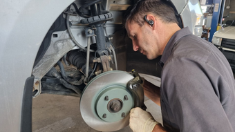 Mechanic Performing Brake Rotor Repair | Cole's Auto Repair & Service