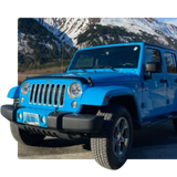 Bright blue Jeep Wrangler parked on a road with snowy mountains in the background