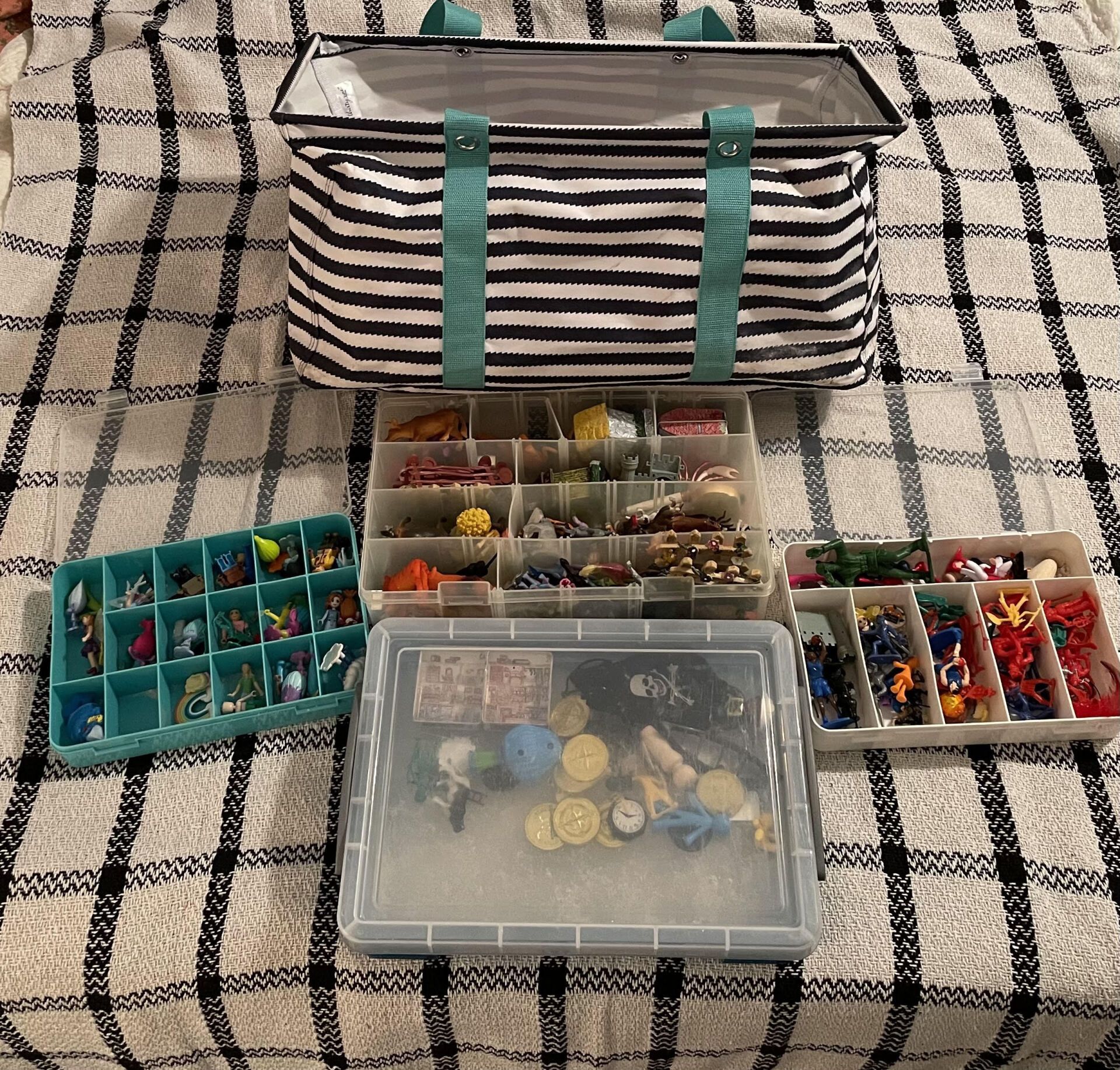 Sandtray Therapy travel kit with miniatures.